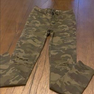 Camo skinny jeans. Distressed knees